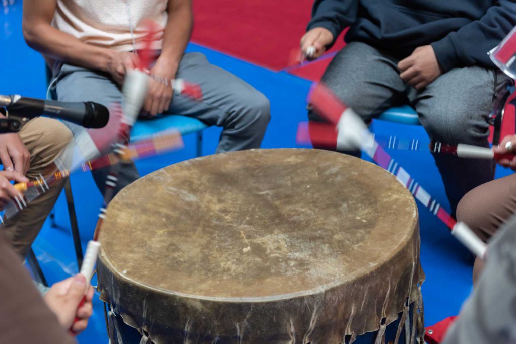 An image of a Ktunxa drum group.