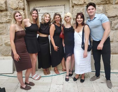 Image shows 6 women and one male standing in front of the University of Dubrovnik in Croatia.