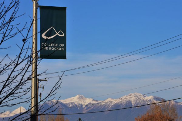 Image shows College of the Rockies banner with mountains in the background.