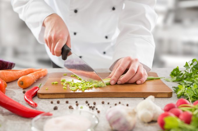 chef cooking food kitchen restaurant cutting cook hands hotel man male knife preparation fresh preparing concept - stock image