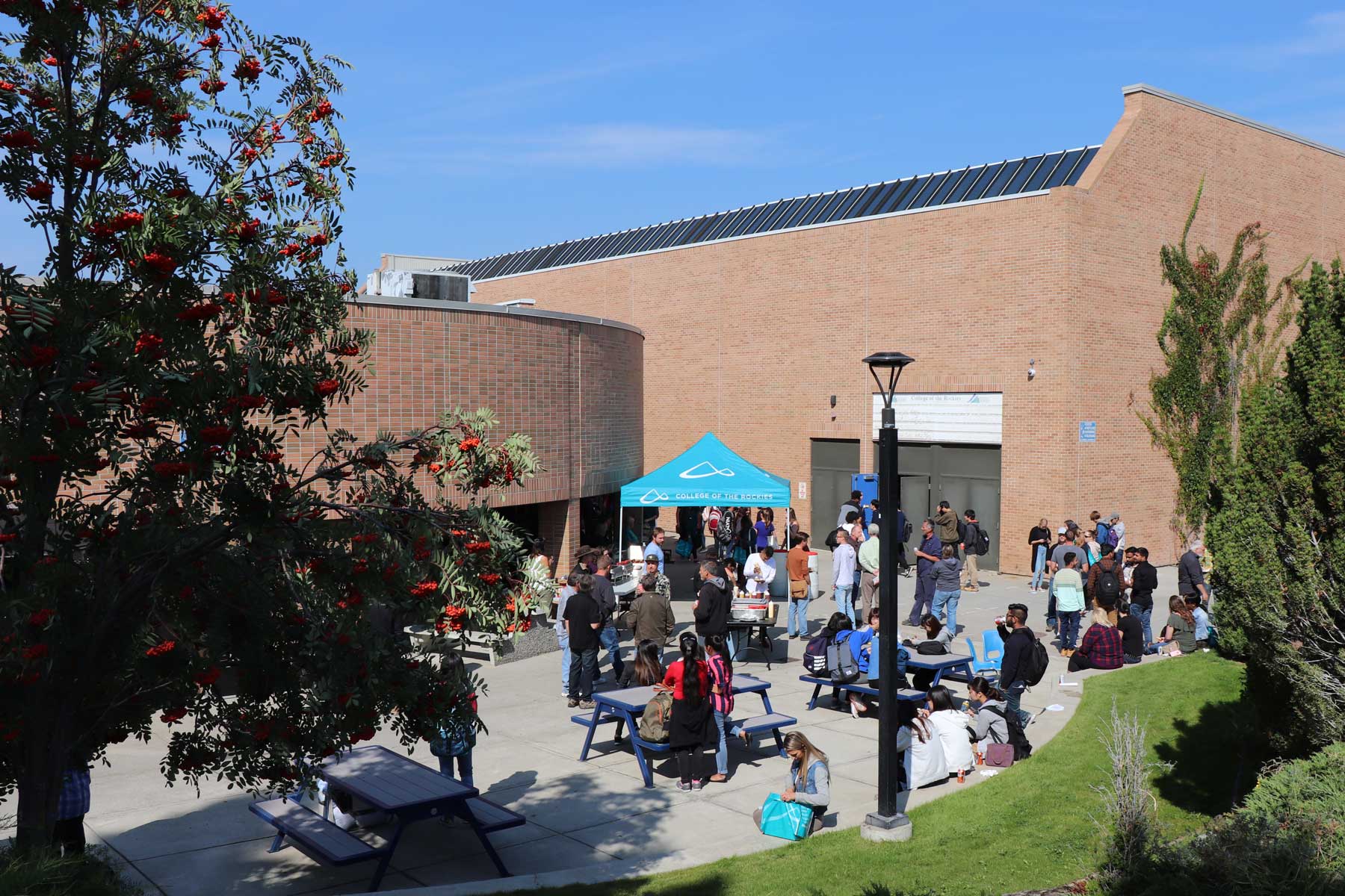 A group of students and employees outside College of teh Rockies Cranbrook campups on Orientation Day.