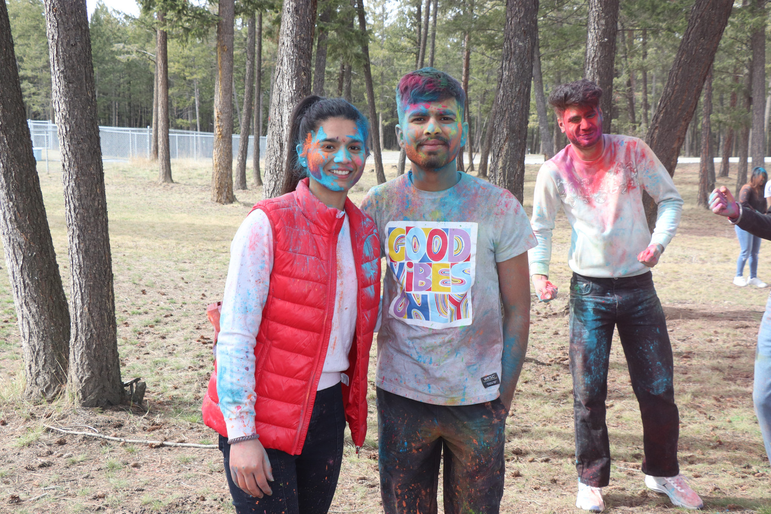 Two students celebrating Holi.