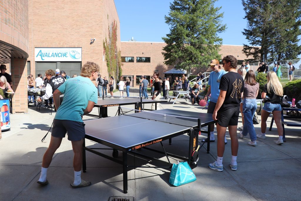 Students playing table tennis