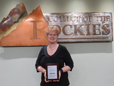 Image of College of the Rockies Articulation Officer, Karen Langan, holding her award.