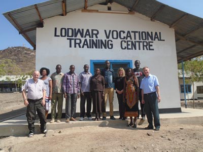 Image shows a group of people outside Lodwar Vocational Training Centre