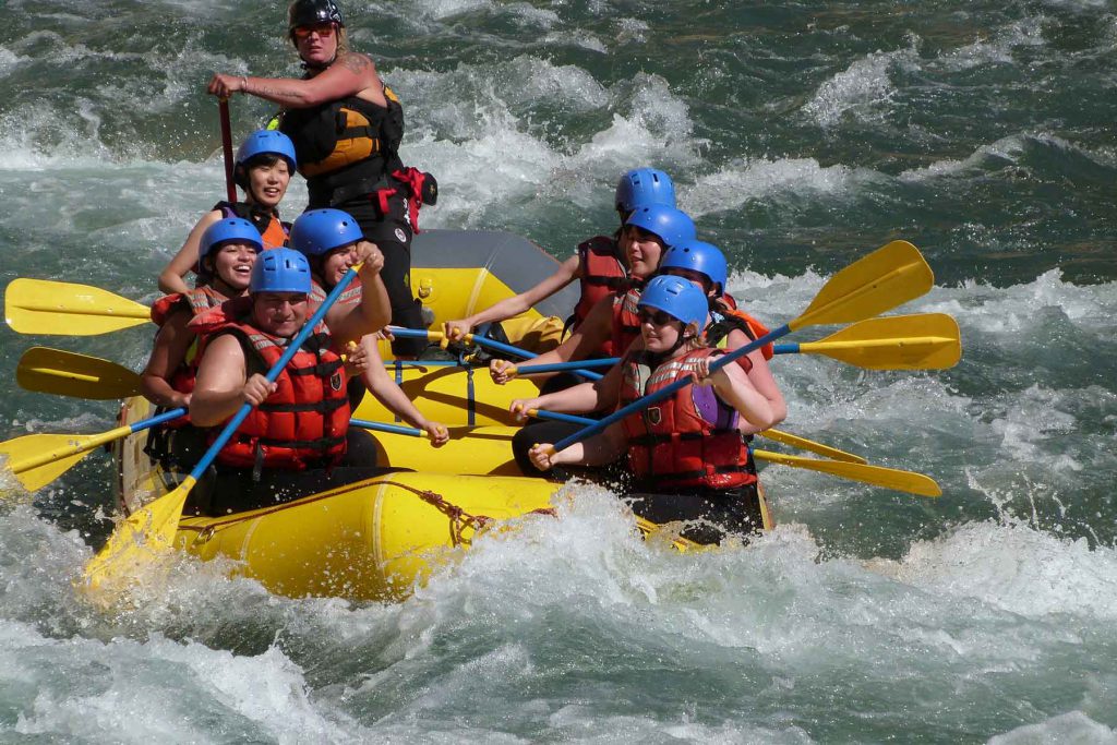 An image of several students white river rafting.