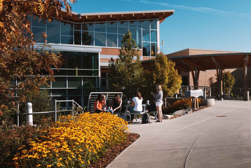 A group of students outside Kootenay Centre at College of the Rockies in Cranbrook, BC.