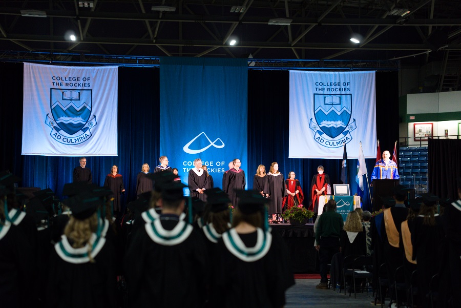 Dignitaries and speakers lined up on stage at Convocation Ceremony.