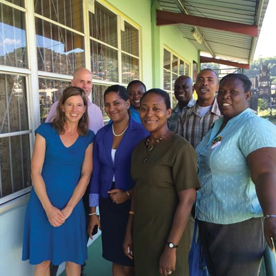 Image of College International Projects and Marketing Specialist Tracey Brenton with representatives from Caribbean and Nova Scotia Community College.