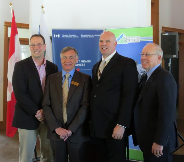 Image of four men, including College President David Walls and Kootenay MP David Wilks