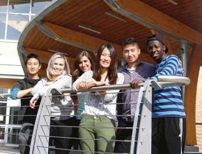 An image of international students near the college entrance.